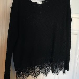 Black sweater with lace hemming
